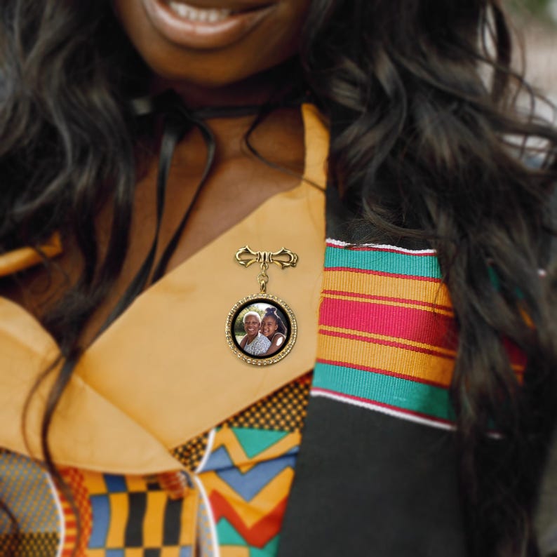 Customized graduation lapel pin with picture, offering a personal touch to your commencement attire.