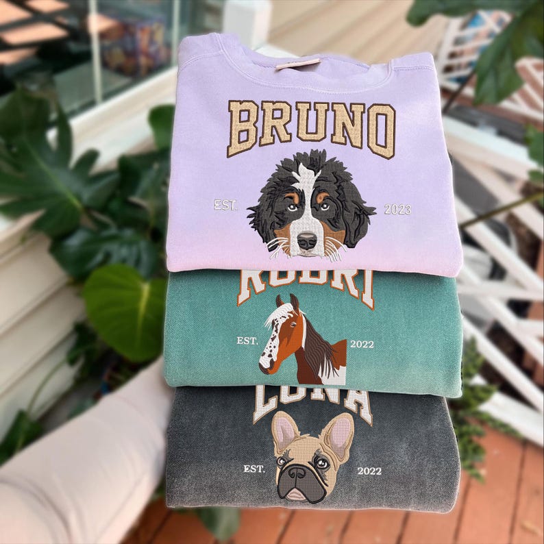 This embroidered dog sweatshirt, a Custom Dog Face Embroidered Sweatshirt, is a cherished photo embroidered sweatshirt and gift for pet owners.