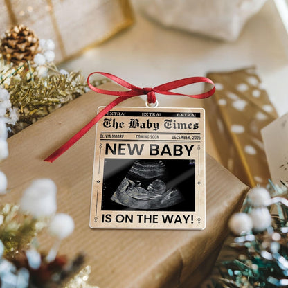 A custom ultrasound ornament and pregnancy announcement ornament, the Personalized Ultrasound Newspaper Acrylic Ornament makes a great personalized Christmas gift.