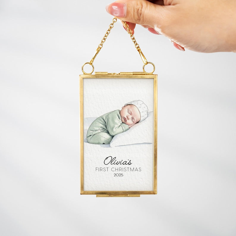 The perfect personalized baby's first Christmas ornaments, this Watercolor Baby Portrait Frame Ornament is a custom photo frame ornament.